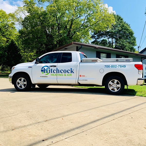 hitchcock truck in front of house